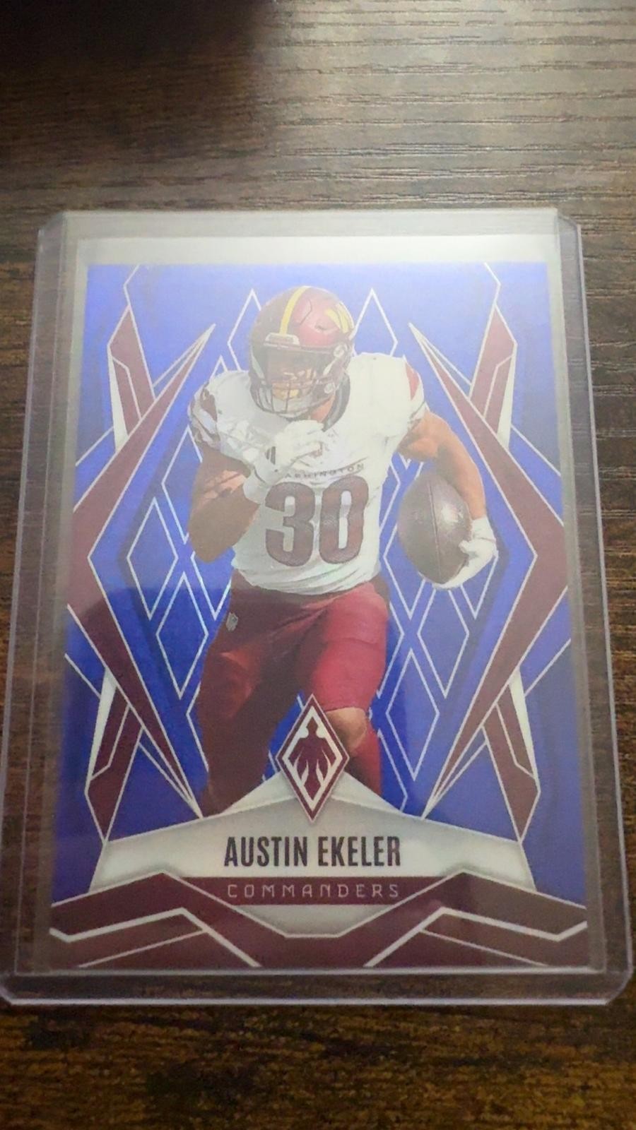 2025 Panini Phoenix #103 Austin Ekeler Blue Winter Prizm #/199