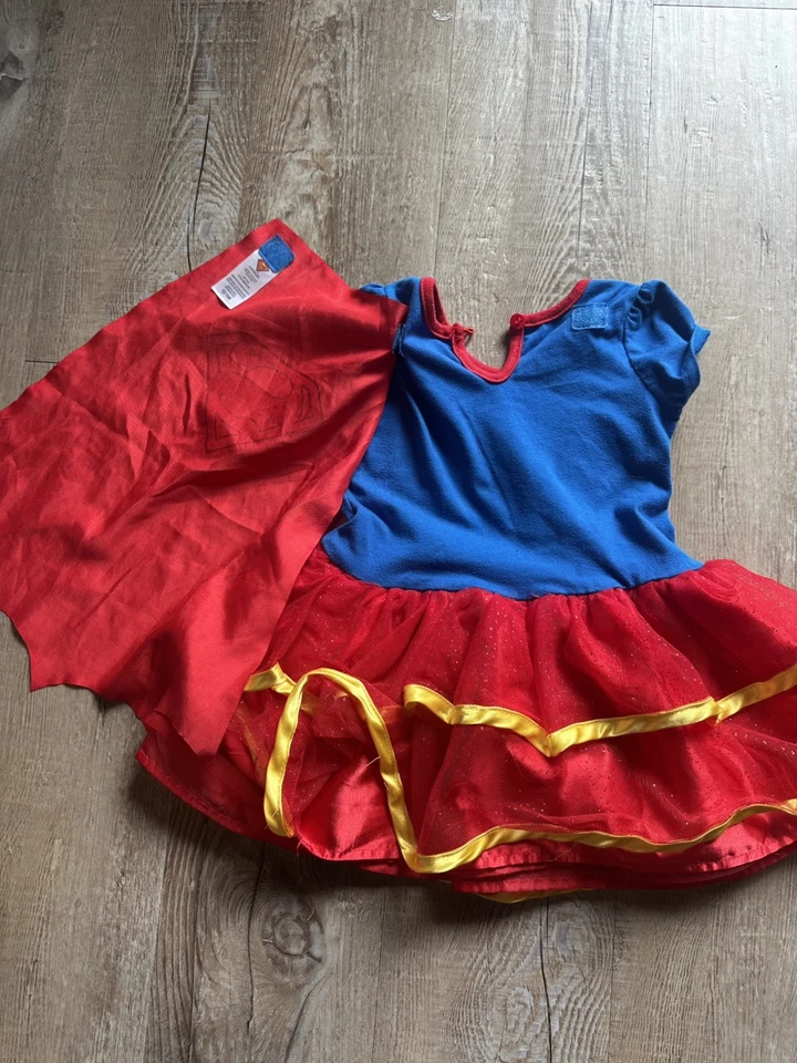 DC Comics Supergirl Bebé Niña Disfraz 12-18 Meses Vestido y Capa  Foto 2 de 4