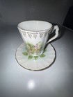 Vintage Hand-Painted Floral Porcelain Tea Cup and Saucer Set — photo 1