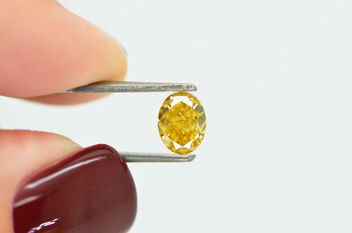 Diamante suelto de forma ovalada elegante naranja amarillo 1,01 quilates certificado VS2 mejorado - Imagen 2 de 9