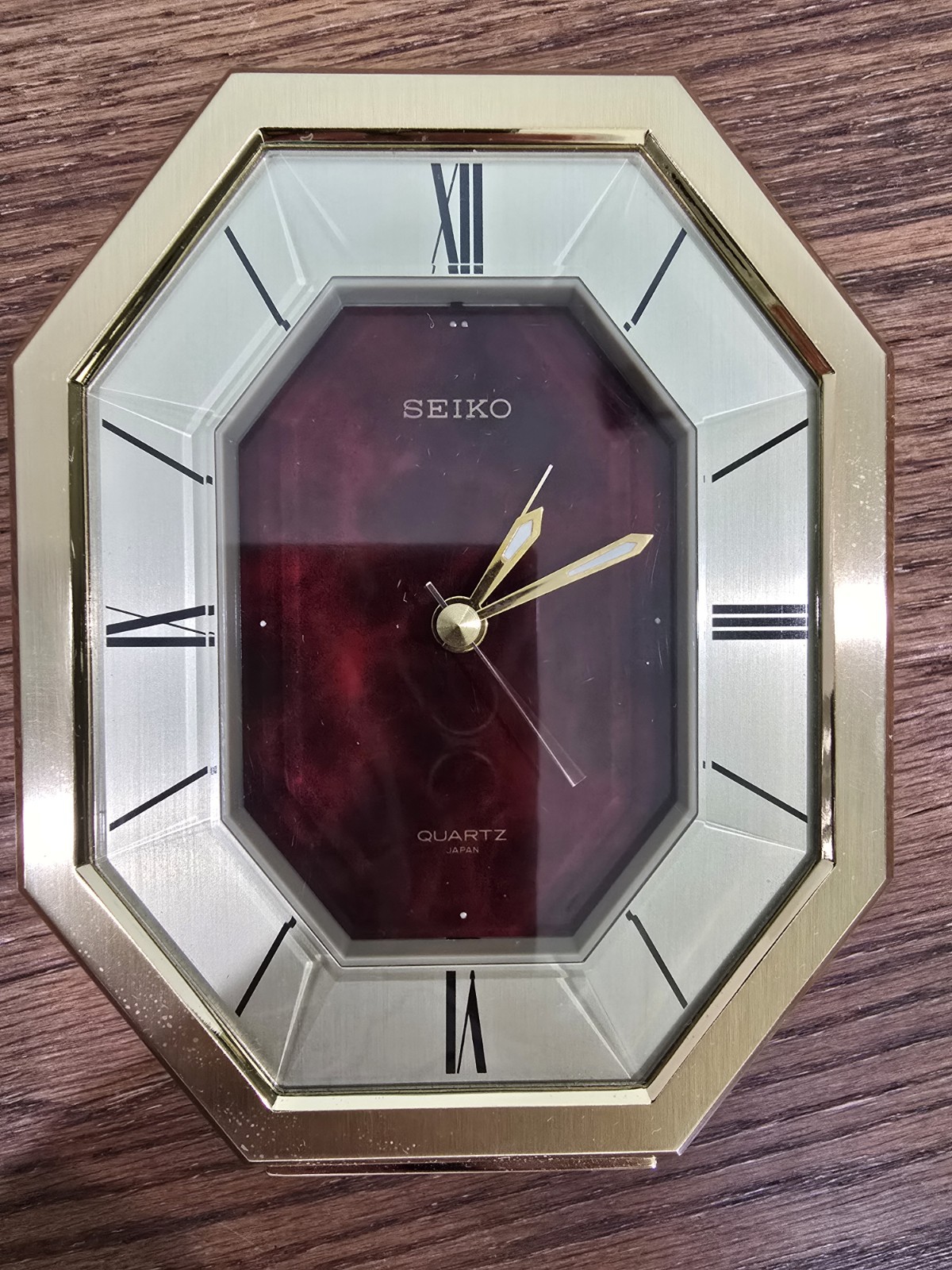 Seiko Quartz desk or table Alarm Clock, dark red face, hexagonal dial