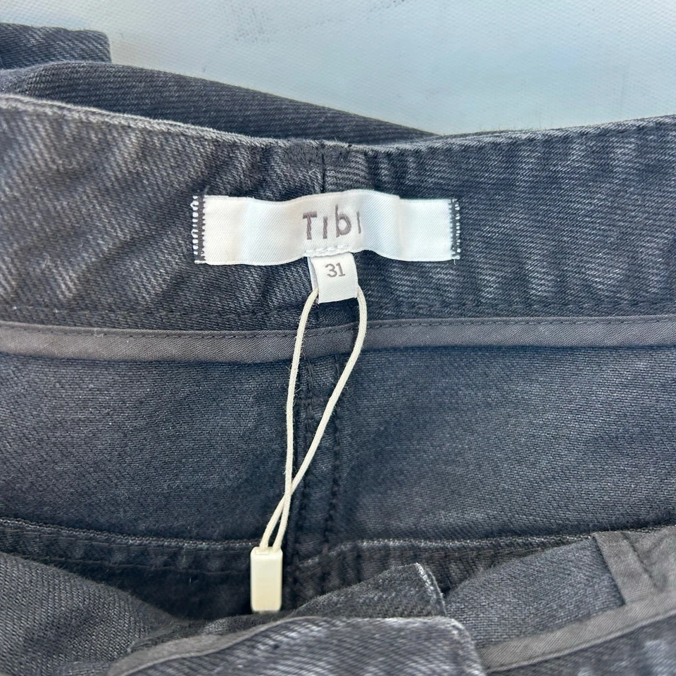 Falda midi de mezclilla negra Tibi con abertura de longitud media Jean talla 31 algodón tiro bajo larga Foto 3 de 4