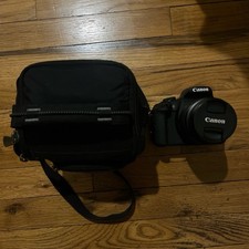 Canon EOS Rebel T7 Camera with 18-55mm Lens  Bag Bundle