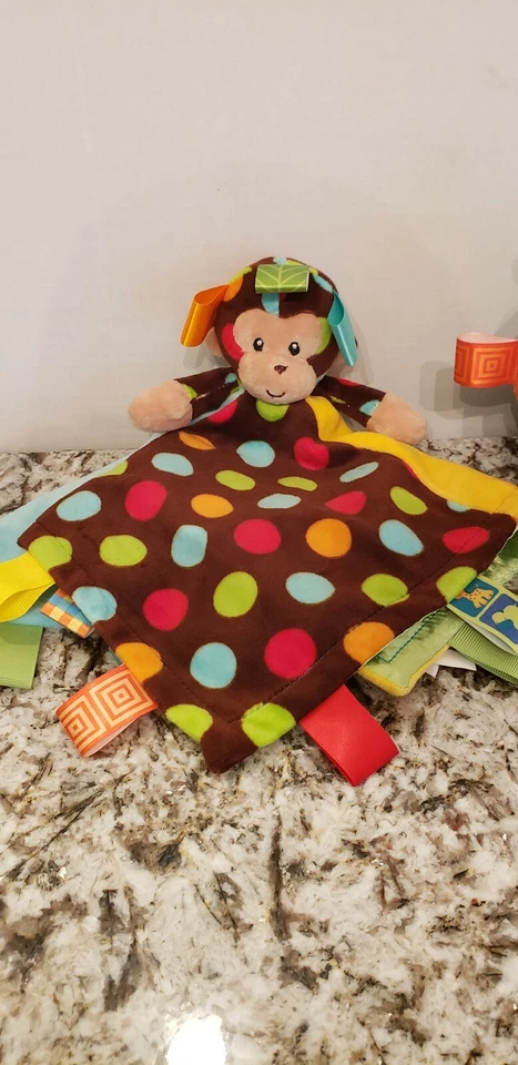 Manta de seguridad de felpa Taggies Monkey Lovey Baby y bola de carillón Taggies. Foto 3 de 4