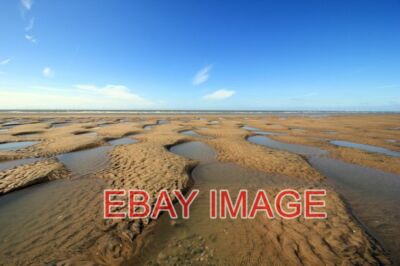FOTO DIE EBBENDE FLUT IN KINMEL BAY DIE EBBENDE FLUT IN KINMEL BAY HAT DEN POOL VERLASSEN