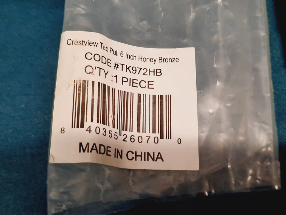 Perillas superiores TK972HB Crestview lengüeta tirador 6" (c-c) miel bronce Foto 2 de 4