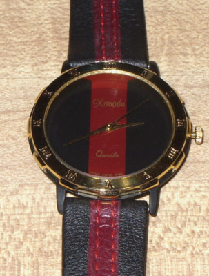 XANADU RED & BLACK BAND AND DIAL FACE LADIES  WRISTWATCH, NEW BATTERY