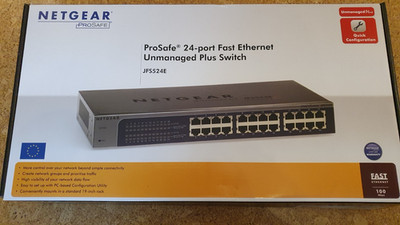 Netgear ProSafe 24 Port Fast Ethernet Plus Switch JFS524E - TOP,  OVP