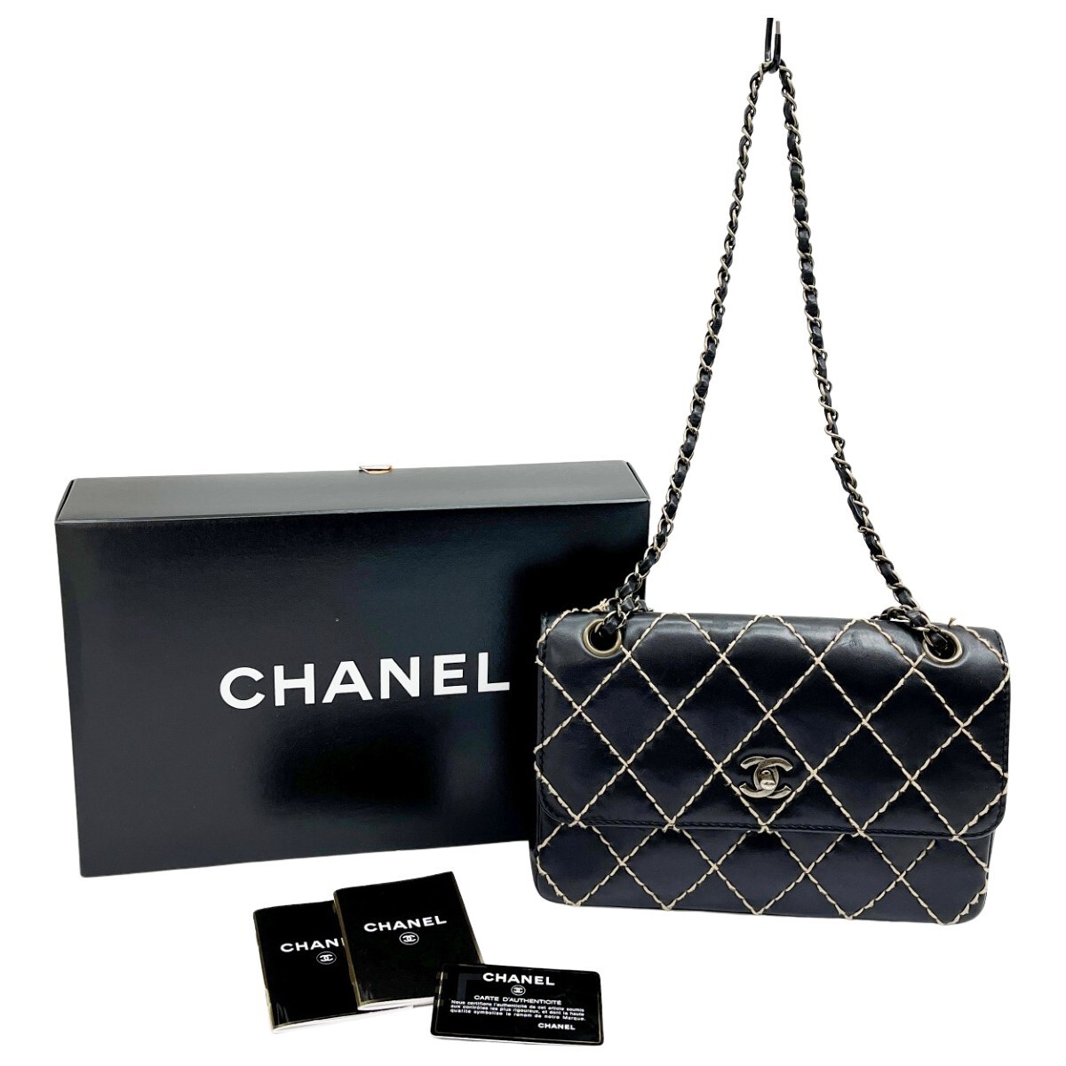 CHANEL Matelass Wild Stitch Shoulder Bag with Chain in Black and Ivory, shows minor wear