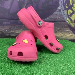pink crocs for men