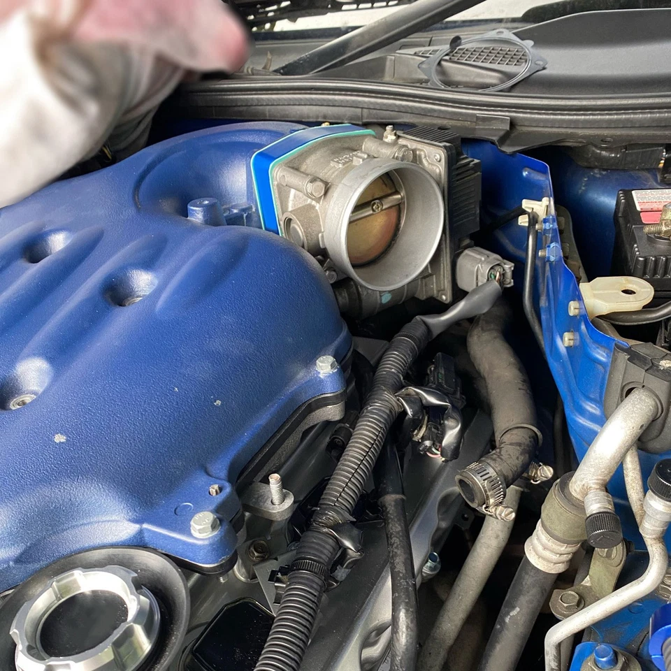 Espaciador de cuerpo del acelerador para Infiniti G35 FX35 I35 QX4 M35 3,5 L Foto 2 de 4