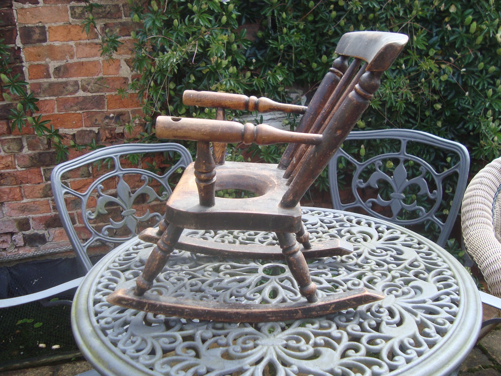 Antique childs potty rocking chair teddy bear dolls chair plant pot