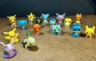 16 Pokemon Figures - Funko Pocket POP Mini and others in lot. Pikachu Charizard
