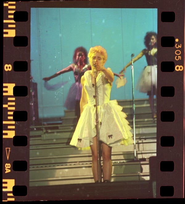 madonna white dress At the 1991 Oscars, channeled Old Hollywood glamour in a sparkling Bob Mackie gown, complete with a fur stole, diamond jewelry, and retro curlsan unmistakable homage to Marilyn Monroe. Attending Madonna in Who's That Girl,