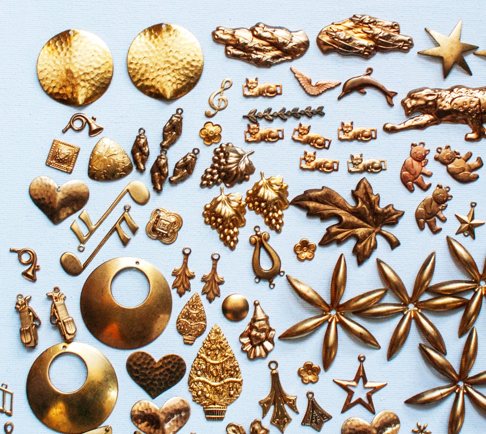 Lot 164  1/2 lb (151 pcs) VINTAGE BRASS STAMPINGS, Prowling Leopard