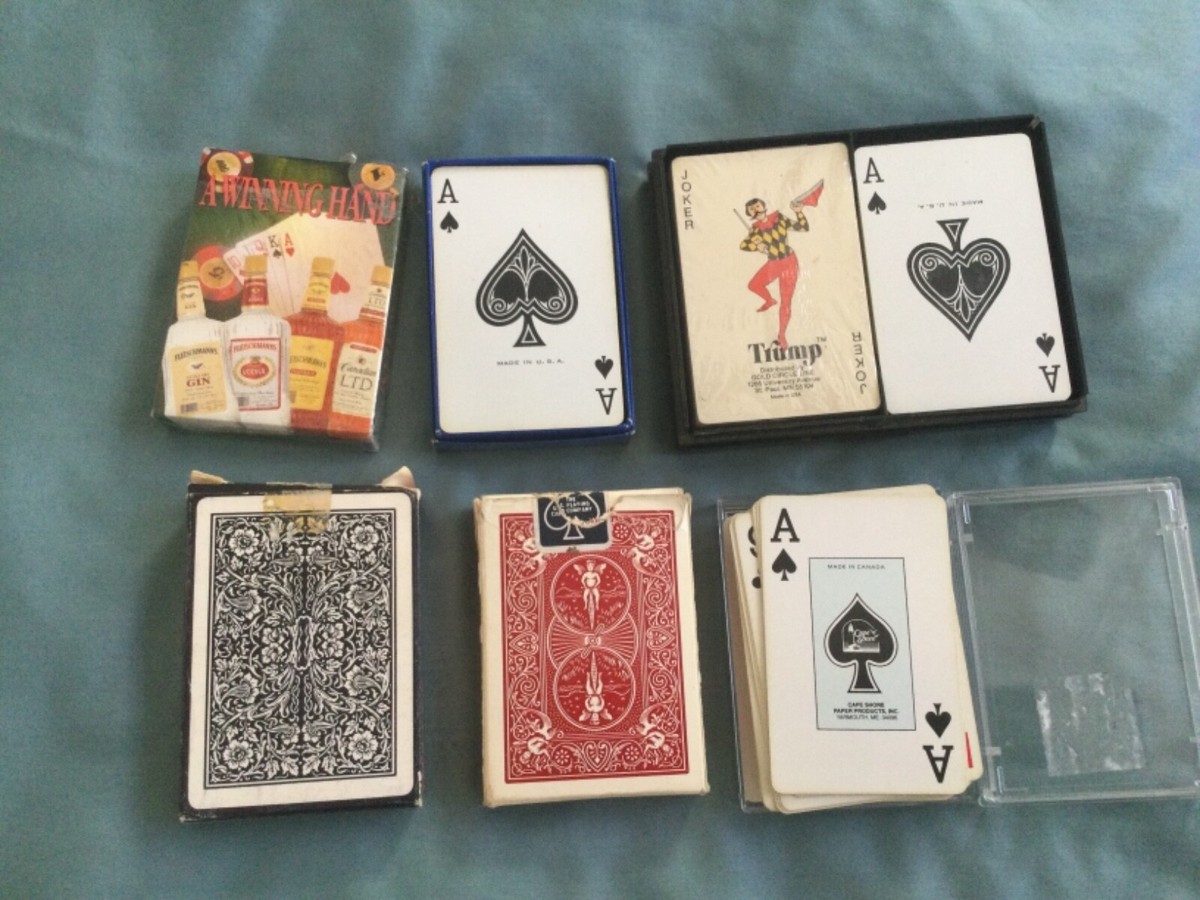 7 decks of poker cards, missing a few jokers, Advertising