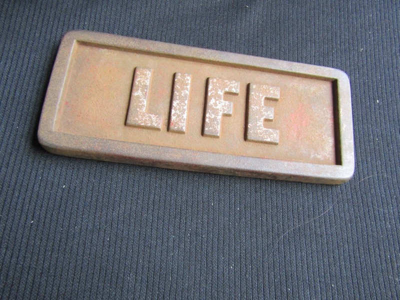 OLD CAST IRON NEWSTAND PAPERWEIGHT ADVERTISING LIFE MAGAZINE
