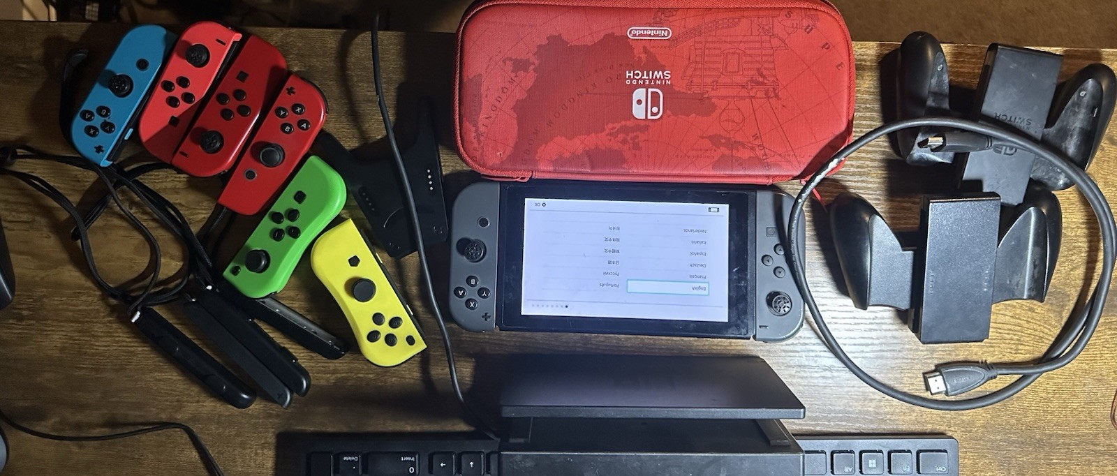 Nintendo Switch With Remotes And Charging Port.