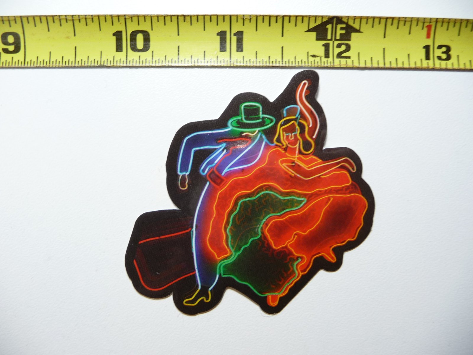 Vibrant Neon Spain Dancing Couple Sticker with Colorful Design