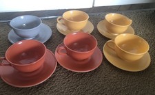 6 Hazel Atlas Tea Cups Gold Yellow, Orange Gray With Plates Vintage Platonite