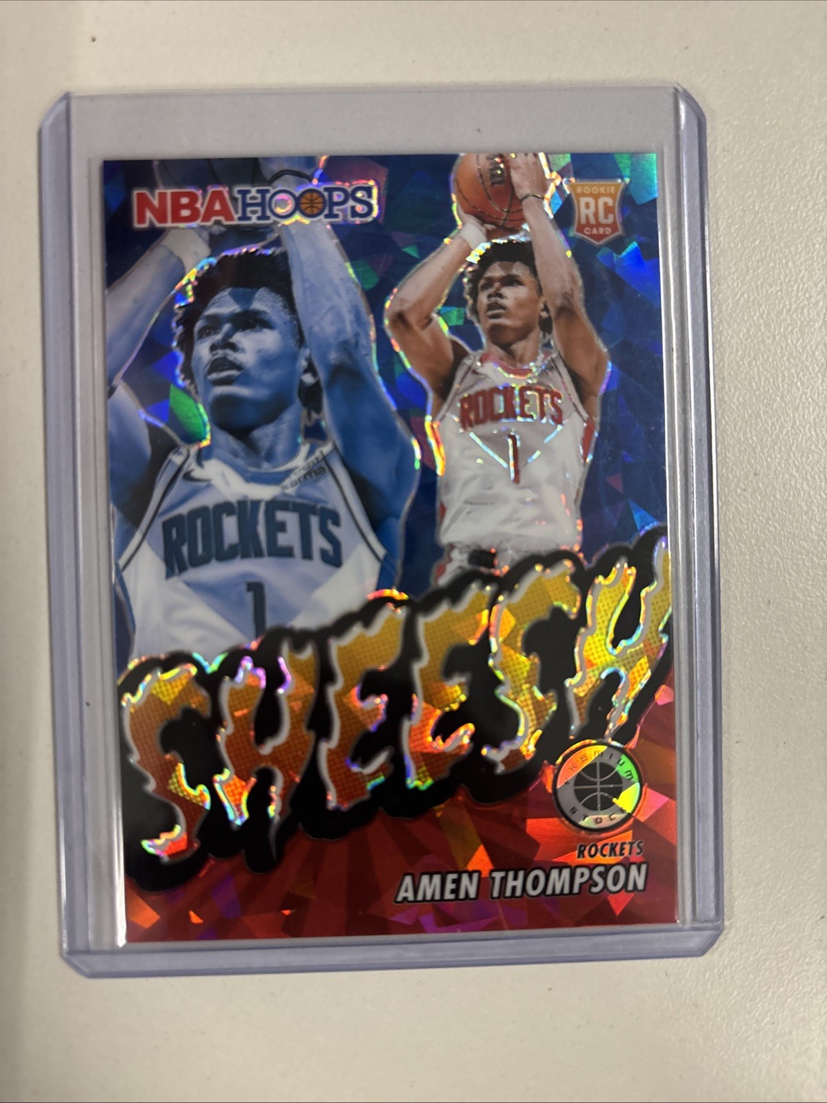 2023-24 Panini Nba Hoops Sheesh Amen Thompson #4 Red & blue Disco Prizm /99 (RC)