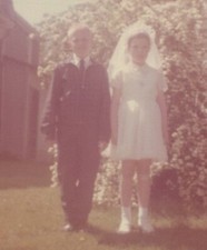 1960s Boy Girl Communion Veil Standing Outside Bush Blooming Porch