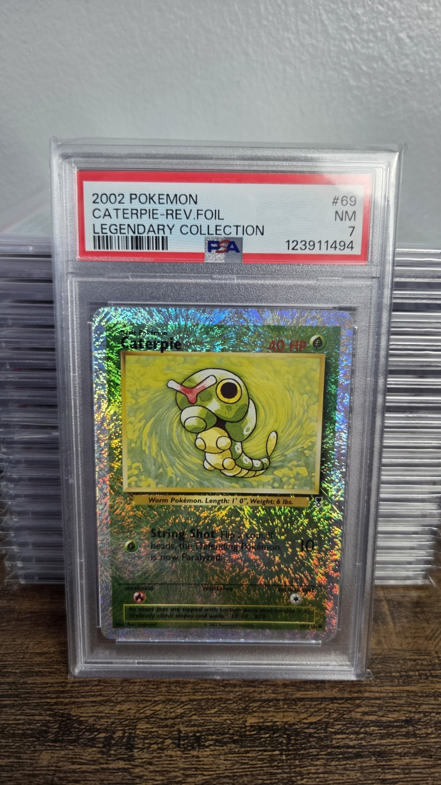 PSA 7 NM Caterpie Reverse Holo 69/110 Pokemon 2002 Legendary Collection 7130