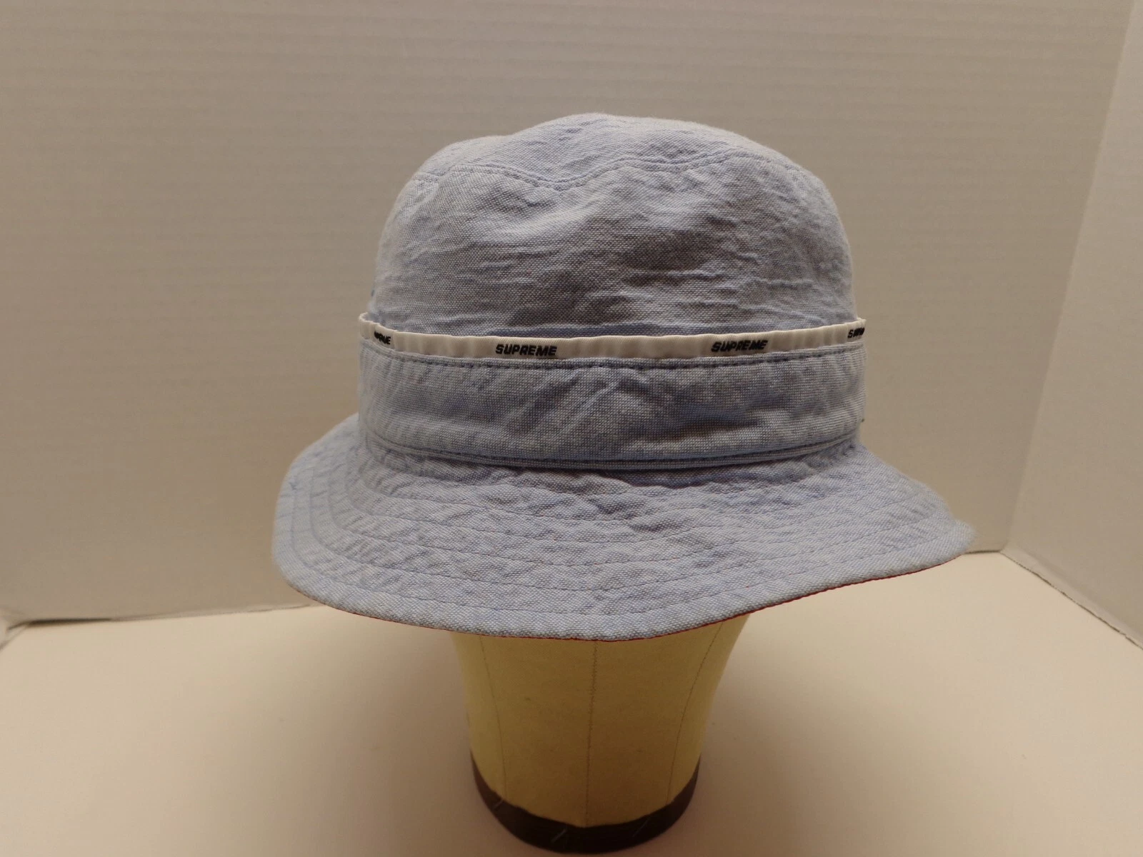 Chapeau seau suprême réversible bleu et rouge petit/moyen