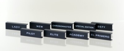 9 x Zenith Plakette Aufsteller ''Academy - El Primero - Elite- Lady - Pilot - Def
