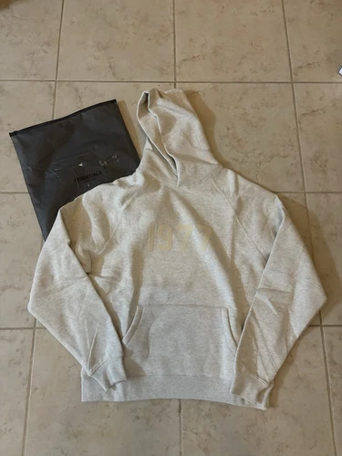 Felpa con cappuccio Fear Of God FOG Essentials 1977 Light Avena taglia S