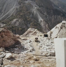 Carrara Marble Quarry Quarry workers and stone carvers extract blo- 1960 Photo 1