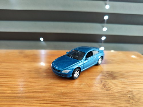 Welly 8209 BMW 645 Ci blau + Friktionsmotor