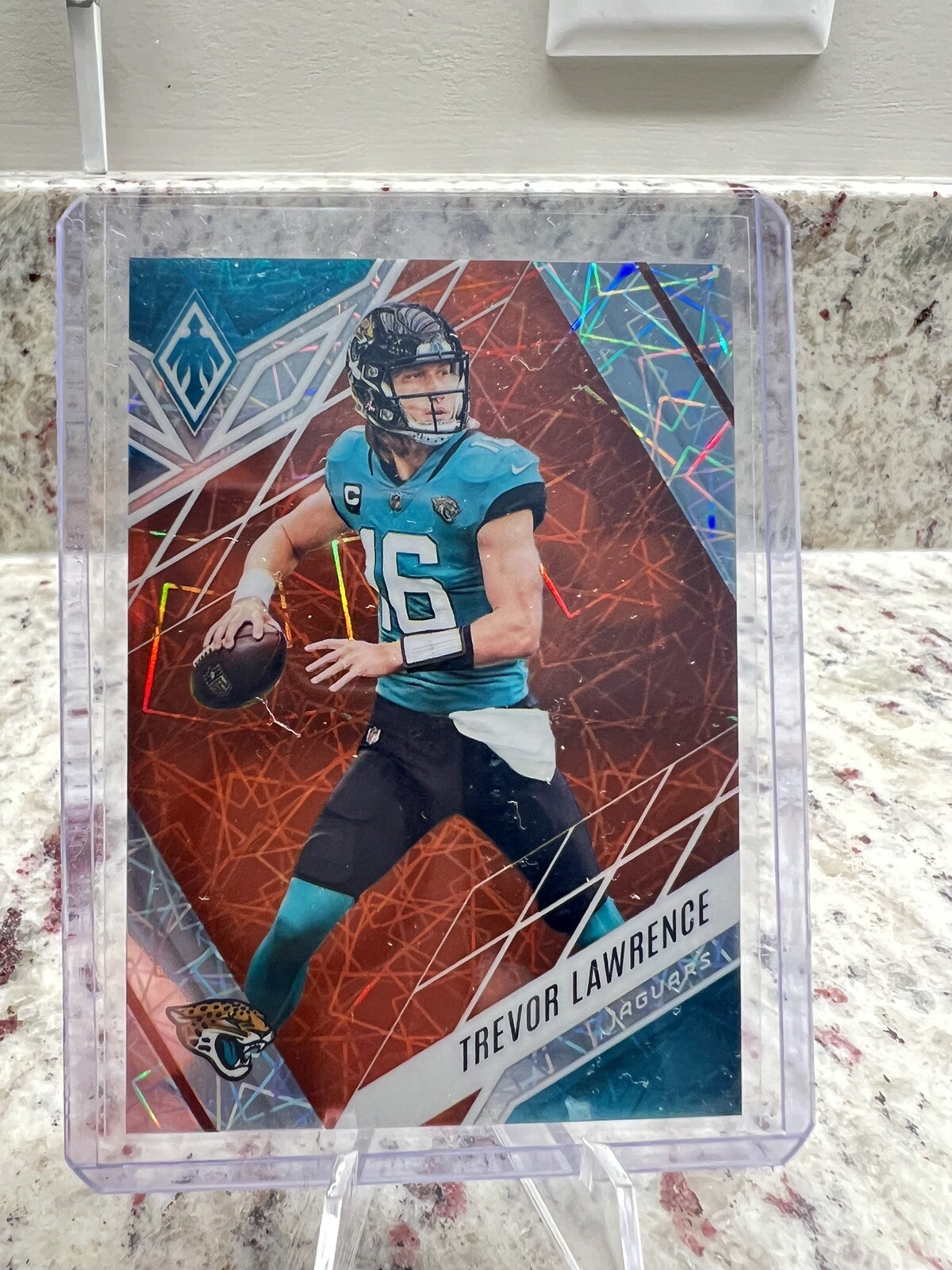 2022 Panini Phoenix Football #33 Trevor Lawrence (Orange Lazer) 61/75