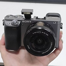 Sony Alpha A6000 24.3MP Mirrorless Camera w/16-50mm Lens Kit Gray 95 New