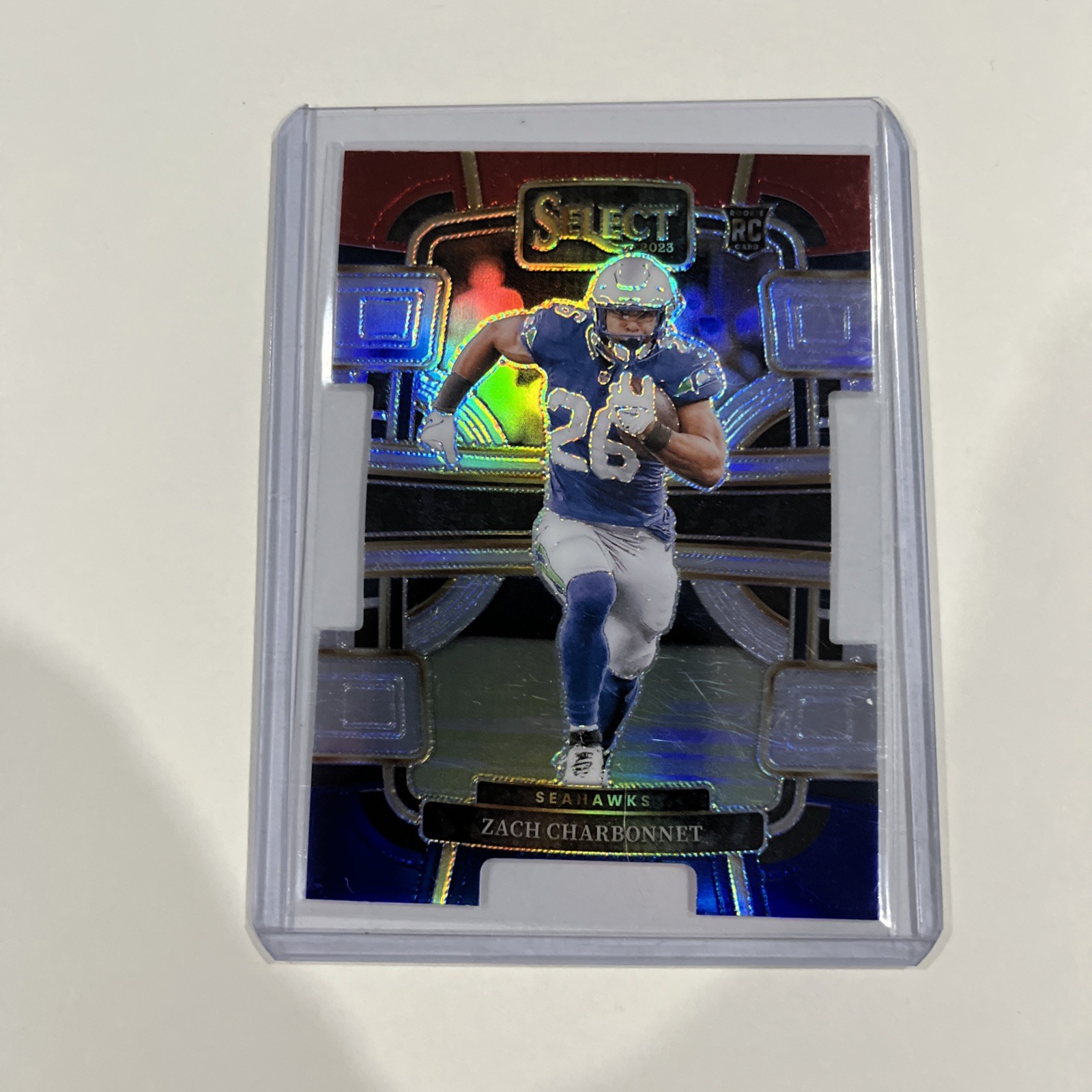 2023 Panini Select - Concourse Red & Blue Prizm Die-Cut #86 Zach Charbonnet (RC)