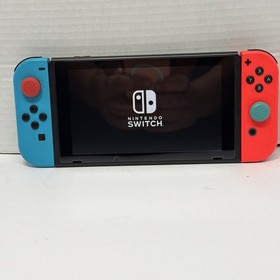 Nintendo Switch V1 Bundle - Neon Joy-Cons, DreamGear Grip, Hotel Transylvania 3