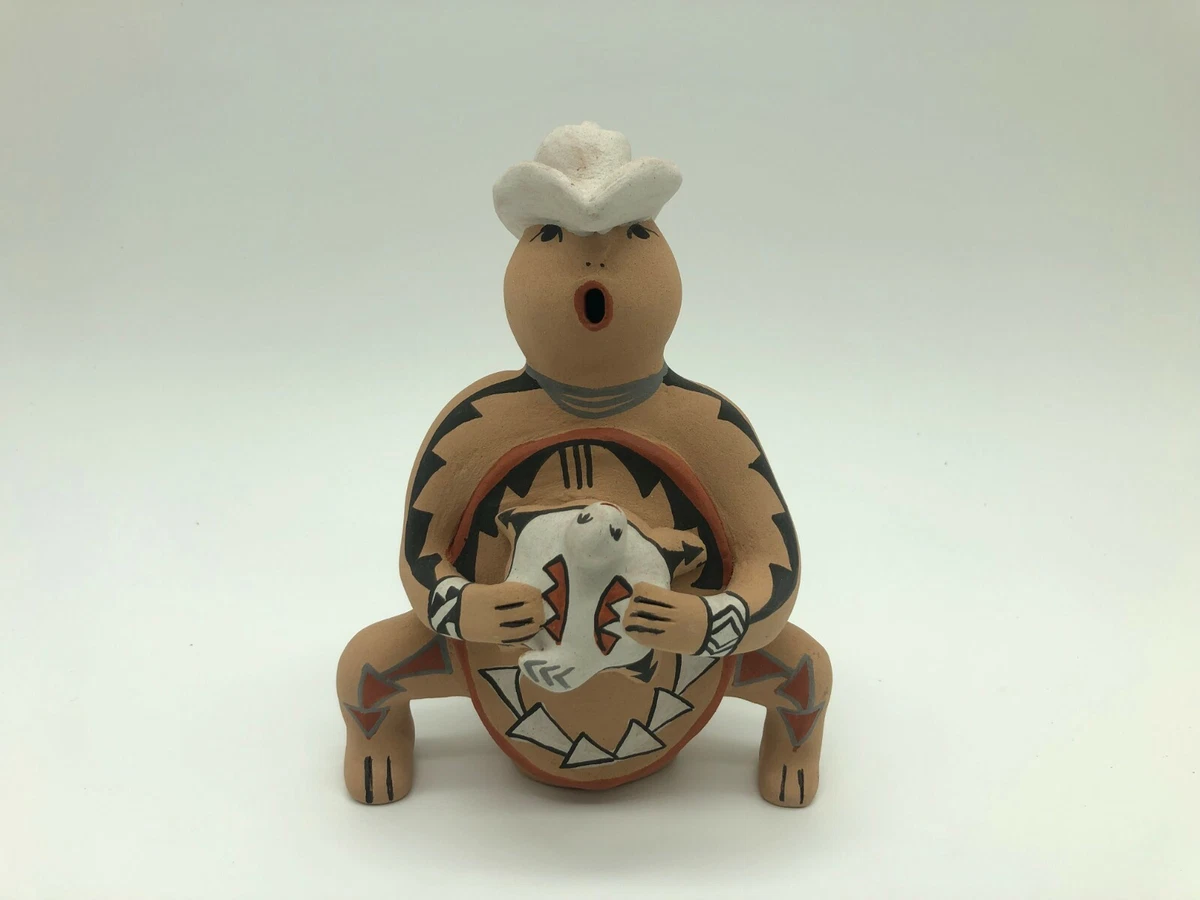 Christmas Dog Storyteller by Darrick Tsosie, Jemez Pueblo www