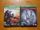 LOT OF 2 Microsoft Xbox One Titanfall & Evolve READ