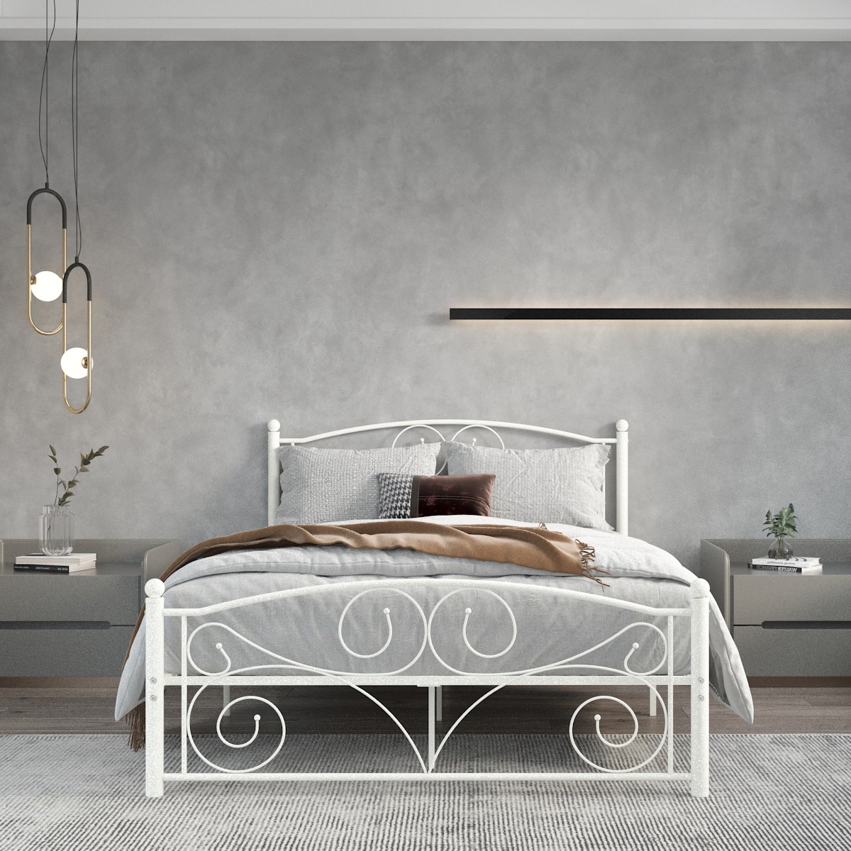 White metal bed frame with unique floral scrollwork headboard and footboard, placed in a light gray bedroom with bedside tables.