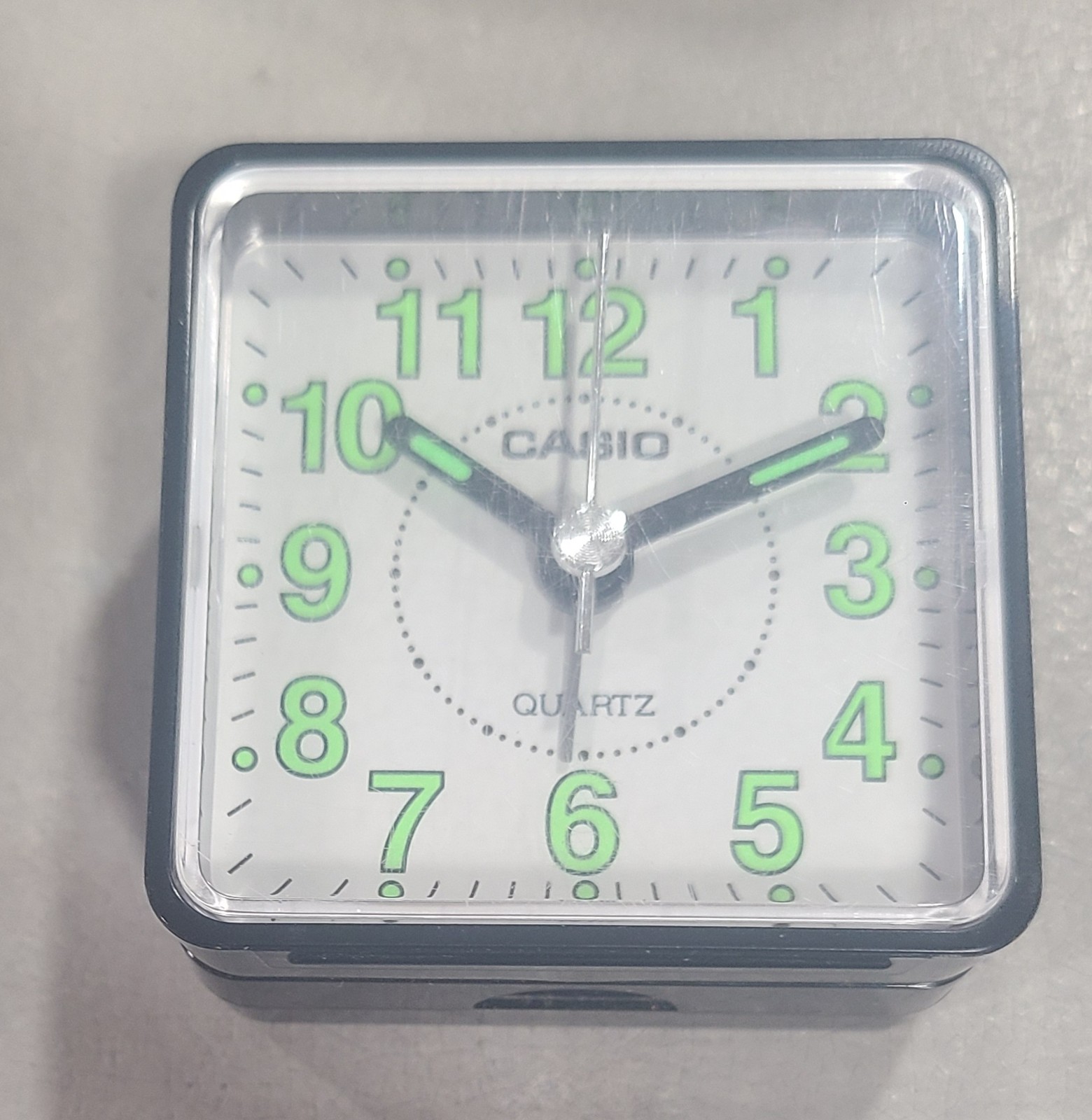 Casio TQ140 Travel Alarm Clock - Bla Clock Radios