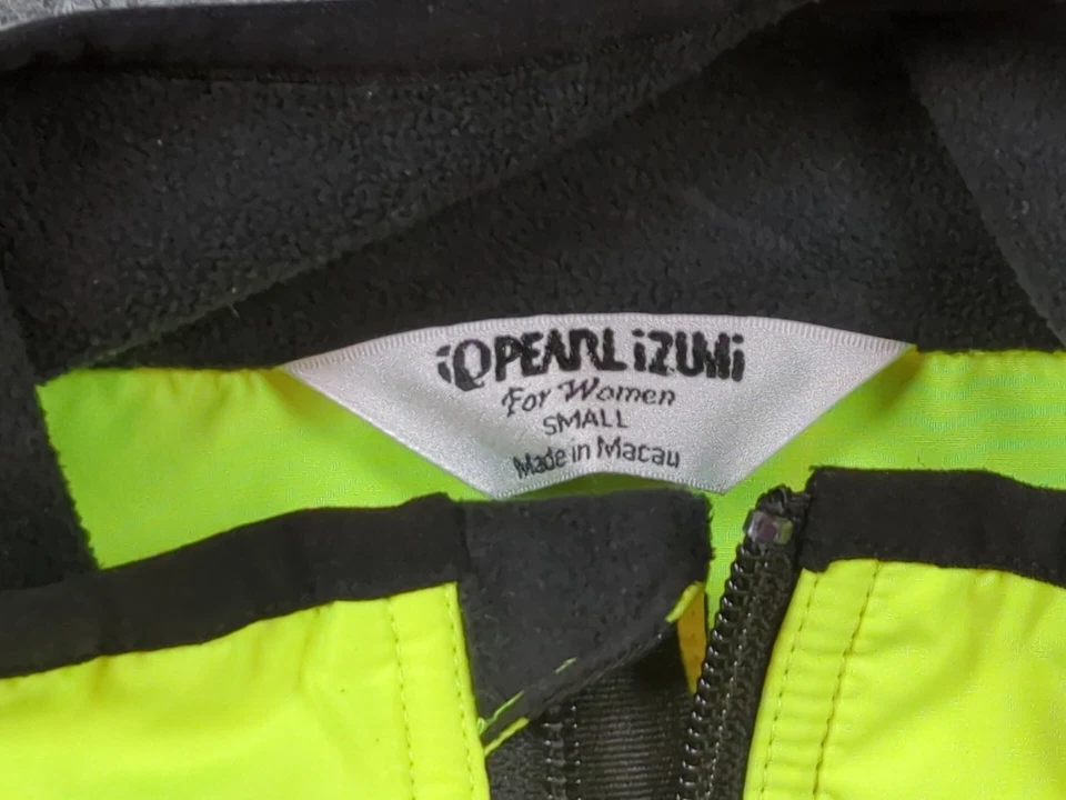 Chaqueta cortavientos Pearl Izumi para mujer pequeña amarilla reflectante cremallera completa ciclo  Foto 3 de 4