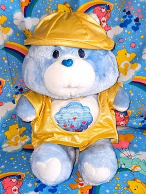 Vintage ''Grumpy'' Care Bear  mit Rainy Day Slicker - orig. Kleidung - top Zustand
