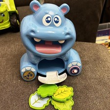 Happy Kids Toy Co Happy Cookie Eating Hippo - English  Spanish