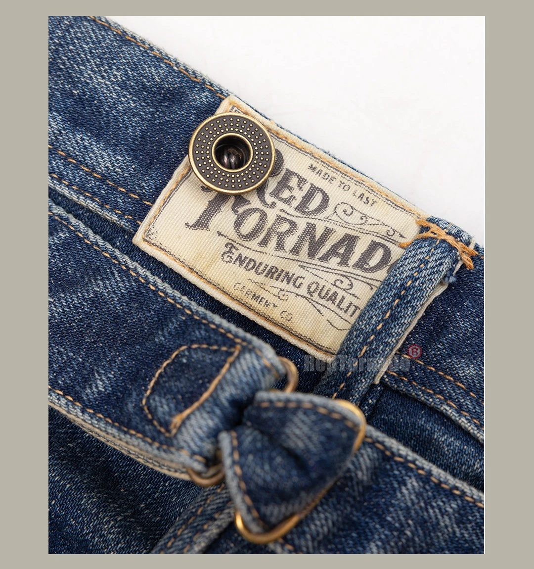 Red denim jeans tag with “Made You Last” text, front button closure, and two front pockets.