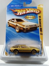 Hot Wheels 2010 Gold 81 Delorean DMC-12 , gold Wheels, Opening Rear Hatch M30