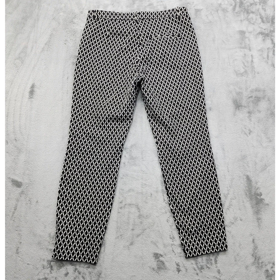 Pantalones para mujer H&M 10 negros blancos estampado geométrico ajustados tobillo cremallera lateral elásticos Foto 3 de 4