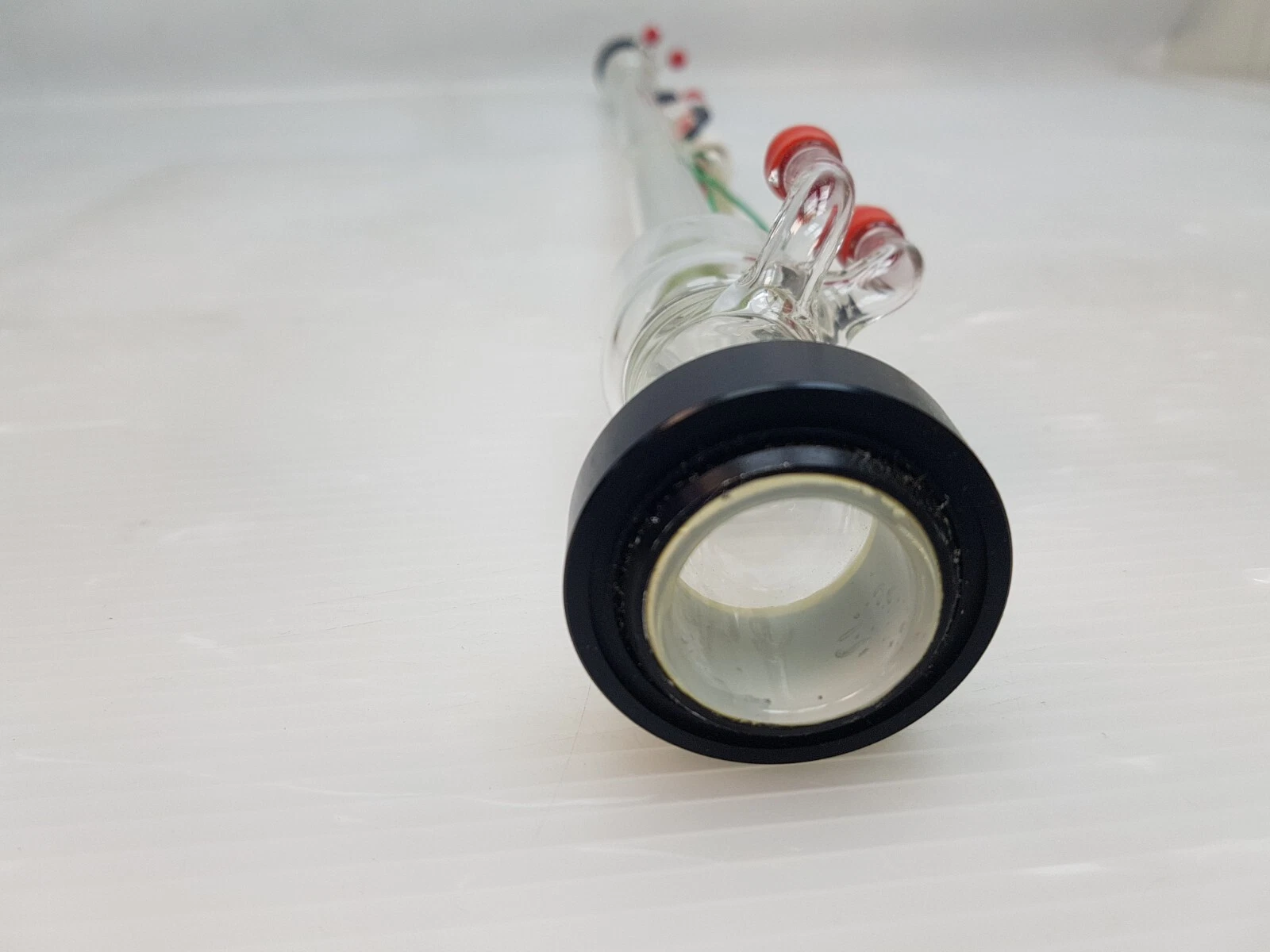 View into the black end mount of the Sharplan laser tube