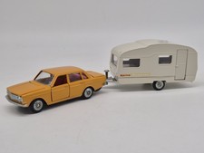 Tekno Denmark Volvo 144 orange mit Sprite Musketer 815 Wohnwagen 