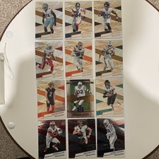 2025 NFL Revolution Card Lot ( 12 Cards) Three Cosmos Included!!!