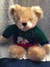 furry teddy bear with knit sweater. Long beige fur. Plastic eyes embroidered